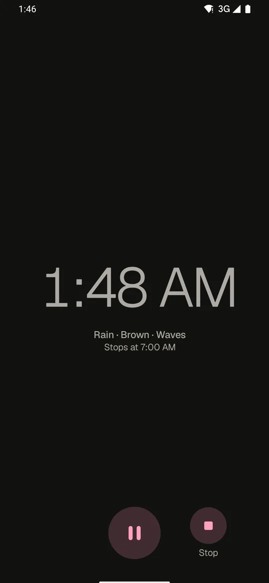 The dim night screen: the time, what plays, Pause and Stop